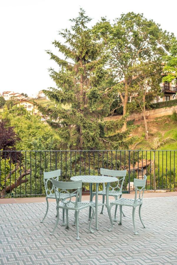 Apartamentos Boutique Fuente Real Comillas Exteriör bild